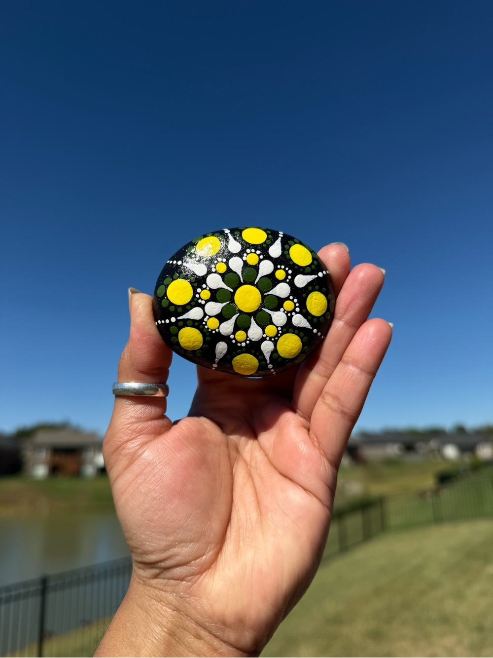 Hand-Painted Black Stone with Yellow Dot Mandala - Home Art